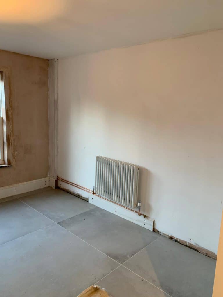Principle Carpentry - Bookshelf Bridge over Radiator (before)
