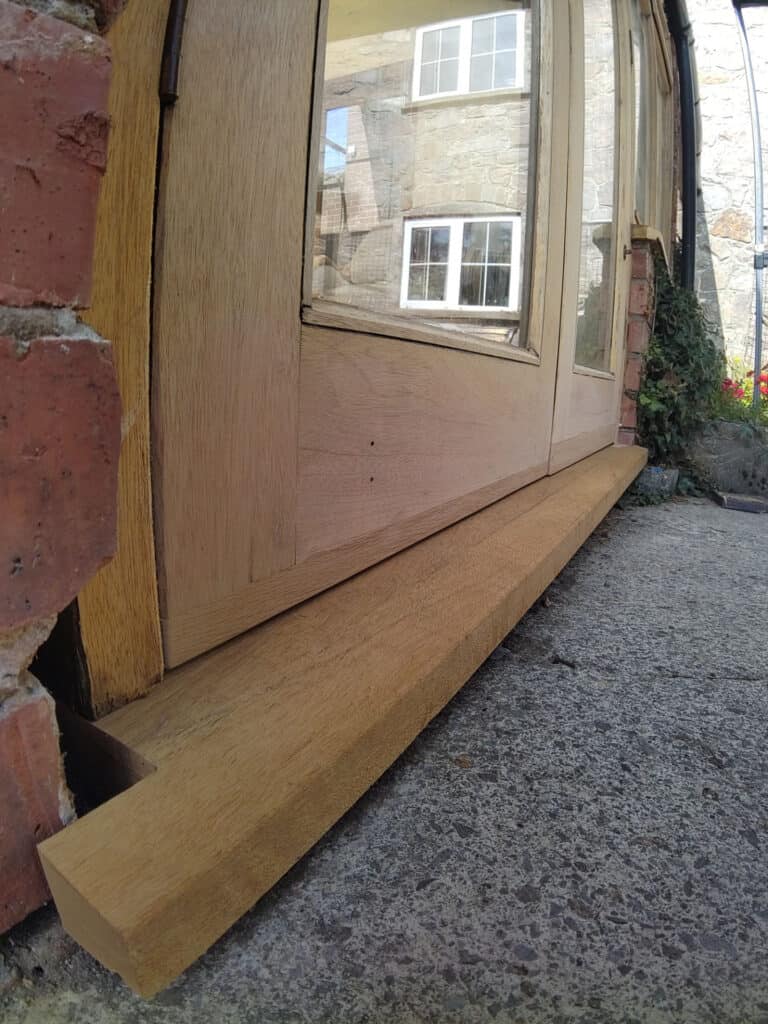 Principle Carpentry - Tudor House Restoration - New Sill & Patches